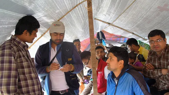 LWF assessment team talking to people affected by the earthquake in Gorkha district. Photo: LWF/C. KÃ¤stner