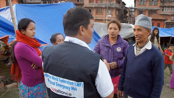 LWF staff discuss the needs of survivors. Photo: LWF/C. Kastner