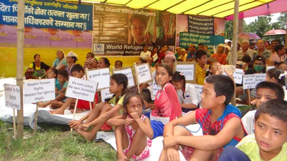 Refugee children demonstrating playcards for their rights on the World Refugee Day 2018. Photo: LWF Nepal.