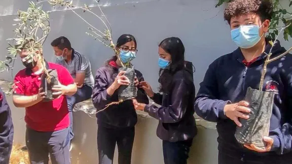 The Environmental Education Center (EEC) of the Evangelical Lutheran Church in Jordan and the Holy Land (ELCJHL) educates youth to be stewards of creation through learning programs and practical activities such as planting olive trees. Photo: EEC