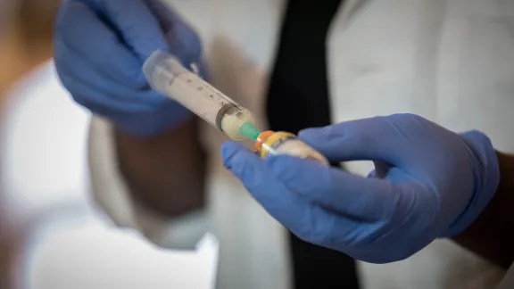 Ganta, Liberia: Antee Baar, a nursing school student training at the United Methodist University campus, practices filling up a syringe. Located in Nimba county, the Ganta United Methodist Hospital serves tens of thousands of patients each year. Photo: LWF/Albin Hillert 