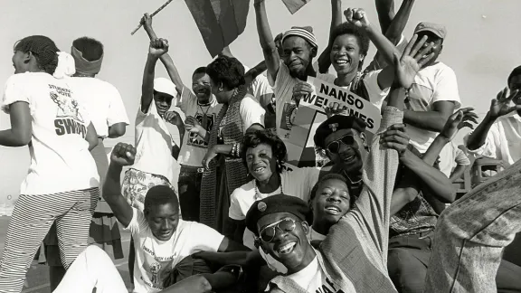 Students celebrate the return of exiled SWAPO leader Sam Nujoma on 14 September 1989