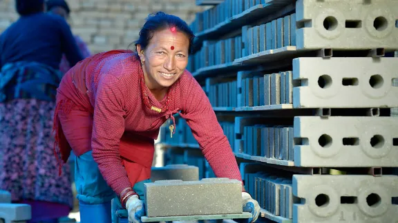 Women in Sanogoan are making the bricks that will form the basis of their new village. Photo: ACT Alliance/Paul Jeffrey