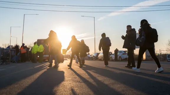 Refugee families from Ukraine make for the bus that is to take them from the VyÅ¡nÃ© NemeckÃ© border crossing between Slovakia and Ukraine and further into Slovakia, on 11 March. The VyÅ¡nÃ© NemeckÃ© border crossing connects Slovakia with the city of Uzhgorod in Ukraine. The crossing sees up to some 10,000 refugees arrive each day since Russia began its invasion of Ukraine. A range of faith-based, civil society and humanitarian organizations provide immediate support to refugees as t