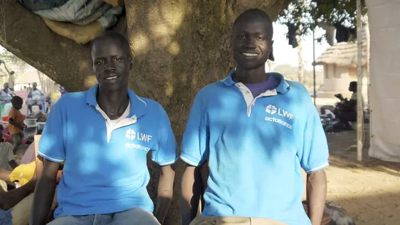 LWF volunteers John Garang and Peter Jok at Adjumani refugee camp, Uganda. DCA/ACT/LWF/Mai Gad