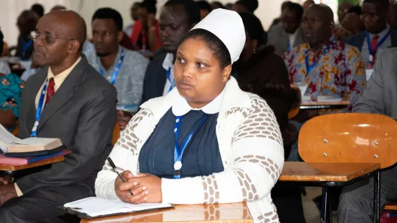 Delegates follow a presentation at the 20th General Assembly of the ELCT at the Tumaini University in Makumira, near Arusha, Tanzania. Photo: ELCT/Nengâida Lairumbe