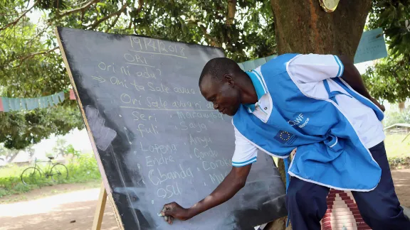 Paul Sunday Odriga teaches students at at Duba Functional Adult Learning Centre in Adjumani district. Photos: LCCN