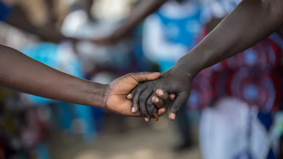 Hands of refugee women from South Sudan at the Palorinya settlement in northern Uganda, supported by the LWFâs World Service program. Photo: LWF/Albin Hillert