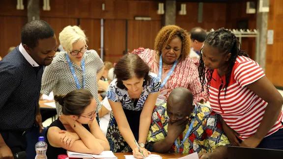 Participants in a group meeting at the faith-based organizations' training on advocacy for women's human rights, co-hosted by the LWF and other FBOs. Photo: LWF/Peter Kenny