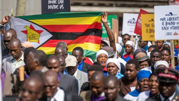 A demonstration by the Zimbabwe Council of Churches, under the theme âThe church says no to violence!â the image was widely shared on social media to advocate for peace. Photo: ZCC