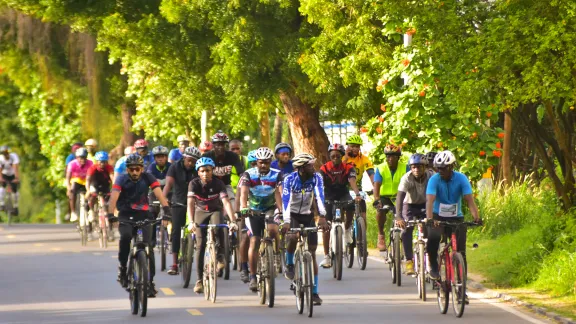 Maro Maua and his supporters cycling through Mombasa