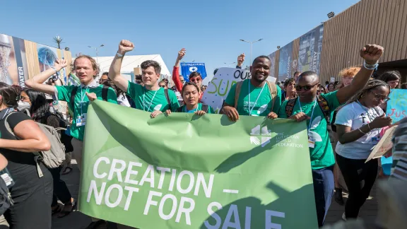 The LWF delegation joins the march through the venue of the United Nations climate change conference COP27 in Sharm el-Sheikh, Egypt, calling for climate justice and urgent action. Photo credit: LWF/Albin Hillert