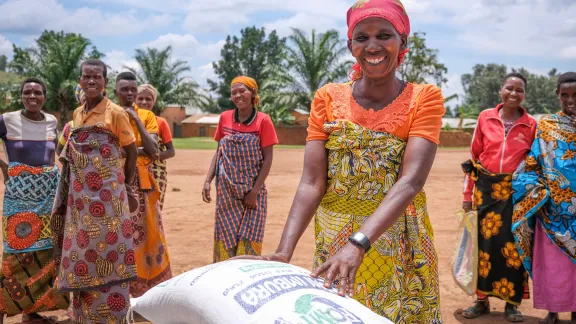  LWF World Service is one of the largest faith-based humanitarian actors worldwide. Its work is carried out through 18 programs in 24 countries in Africa, Asia, Europe, Central America, the Caribbean and the Middle East. The focus is on three programmatic priorities: livelihoods, protection and social cohesion, and quality services. In Burundi, women in a cooperative group receive maize for agricultural inputs. Photo: LWF/L. Gillabert