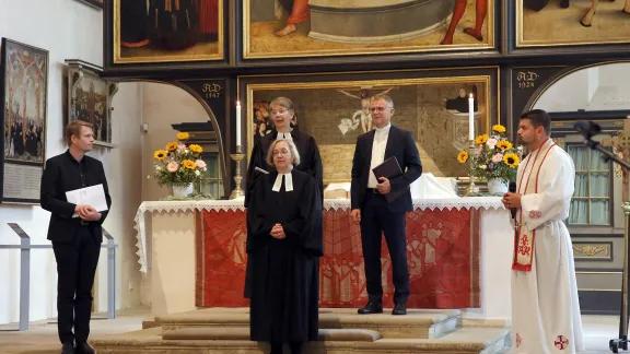 Blessing Rev. Inken Wöhlbrand (center) for her continued journey: (from left) Rev. Dr Dennis Pistol (Evangelical Lutheran Church in Northern Germany), Bishop Kristina Kühnbaum-Schmidt (GNC/LWF), Rev. Dr Ireneusz Lukas (LWF Regional Secretary for Europe) and Rev. Dr Sámuel Nánási (Director of Studies LWF Center Wittenberg). Photo: GNC/Cornelia Kirsch