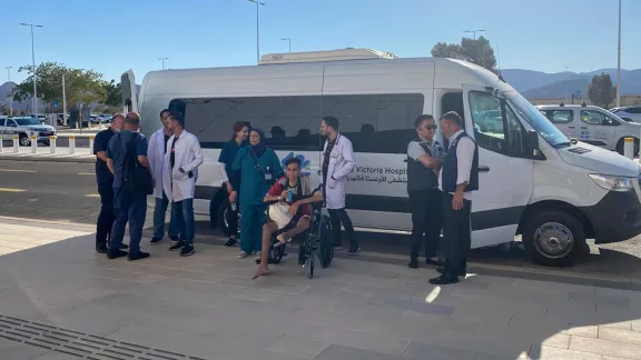 AVH staff wait outside the Kerem Shalom checkpoint for patients to leave Gaza. Photo: AVH/LWF Jerusalem