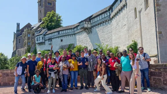 Participants of the 2024 summer school by Mission EineWelt during a visit to Wartburg Castle where the Reformer Martin Luther translated the New Testament into German. Photo: LAC