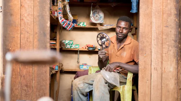 Onesphore Manirakiza received the means to open his own repair shop . Photo: LWF/L. Gillabert