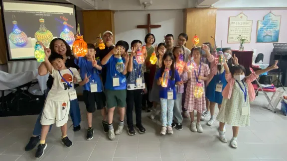 Children with the lanterns made from up cycling bottles. Photo: Praise Lutheran Church, Hong Kong