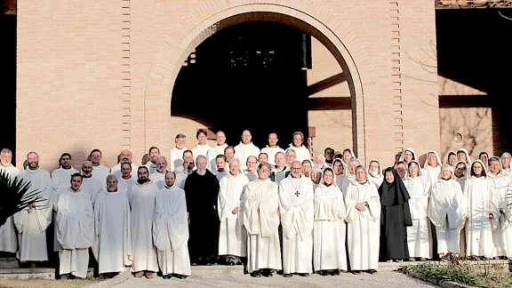 The brothers and sisters of the Bose Monastery gathered outside the community church. Photo: Bose Monastery