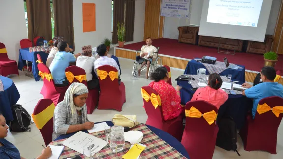 Mahadev Dhamala in a community meeting. Photo: LWF/ D. Lamsal