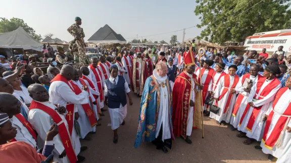 Procession including LCCN Archbishop Panti Filibus Musa (right) and LWF President Bishop Henrik Stubkjær of the Evangelical Lutheran Church in Denmark (centre) and Rev. Dr Rufus Okikiola Ositelu, Church of the Lord (Prayer Fellowship) Worldwide (left) – moves into Covenant Ground. 