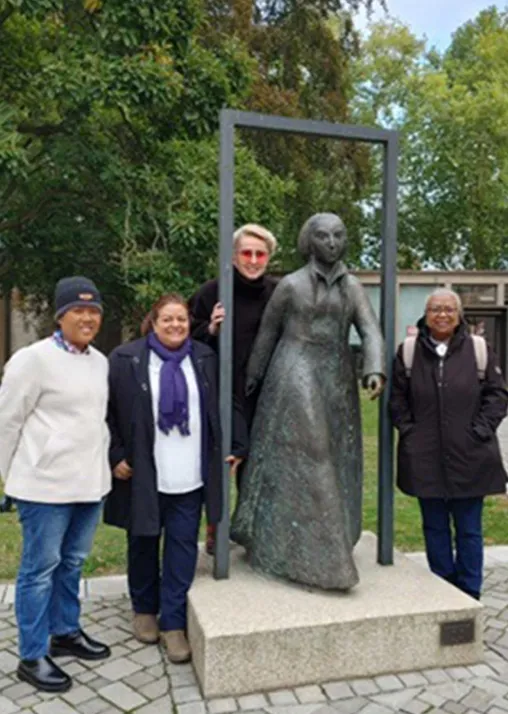 Female bishops with a statue of Katharina von Bora in Wittenberg. Photo: LWF/ Cheryl Peterson